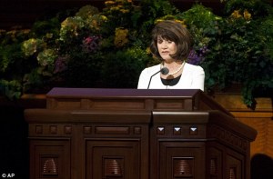 woman prays general conference
